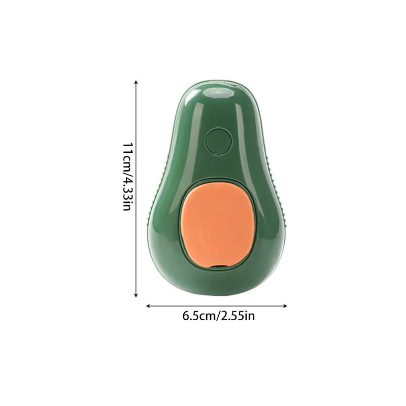 Pet Grooming Brush - A green avocado-shaped pet brush with orange accents, shown with 11cm height and 6.5cm width measurements.