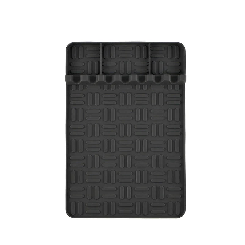 Bbq Grill Tool Rest Mat - Top-down view of a black rectangular silicone mat with a ridged surface and three small divided sections at one end