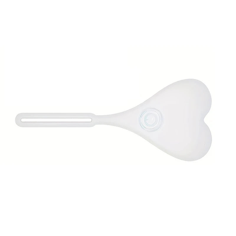Led Bike Tail Rear Light - white heart-shaped silicone light with mounting strap, front view on plain background