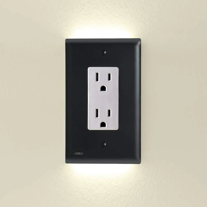 An outlet cover with integrated led night guidelight is shown mounted on a light beige wall, with soft LED light glowing from its top and bottom edges.