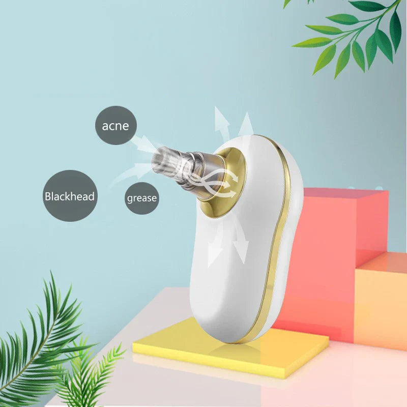 Pore Cleaner - White handheld suction device with gold trim showing extraction of blackheads, acne, and grease