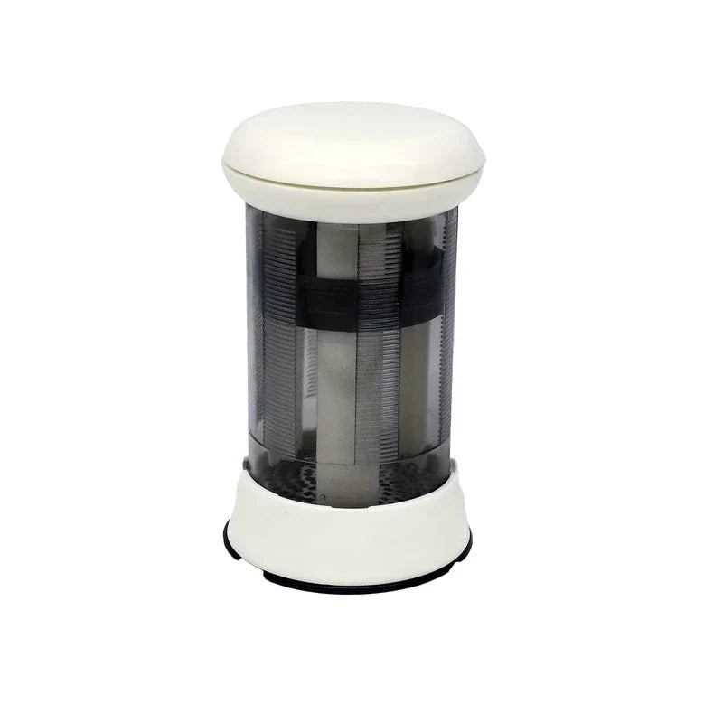 Butter Grater - white and clear cylindrical mill dispenser with white top and base on white background