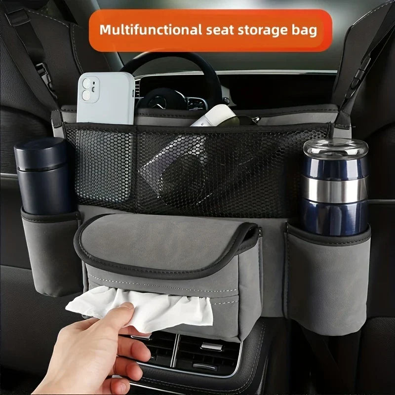 Car Center Console Organizer Hanging Bag - Multifunctional car seat storage bag between front seats, with a hand pulling a tissue from the lower pocket