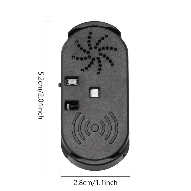 warnung bei geöffneter tür - Kleines schwarzes ovales Gerät mit gepunktetem Windradmuster, Sensor, Schalter und Wellensymbol, Abmessungen beschriftet mit 5,2 cm mal 2,8 cm