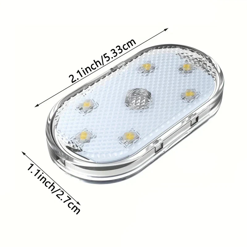 Small oval clear LED light with dimension labels (2.1inch/5.33cm length, 1.1inch/2.7cm width) on a plain white background. Car interior led strip lights are not visibly present.