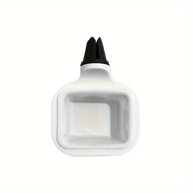 A white car vent sauce holder with a black vent clip on a plain white background.