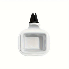 A white car vent sauce holder with a black vent clip on a plain white background.