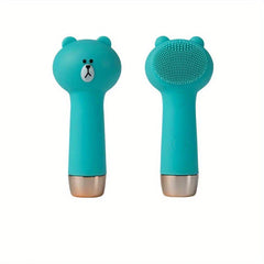 Teal bear-shaped silicone facial cleansing brush, shown front with bear face and back with dot-textured brush head, rose gold base