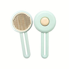 Cat Grooming Brush - Front and back views of a light mint green pet comb with a round head and two-bar handle on a white background