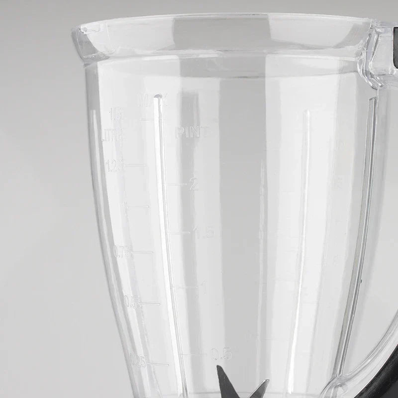 Centrifugal Juicer Machine - Close-up of a clear plastic blender pitcher with molded litre and pint measurement markings and visible blade tips at the bottom