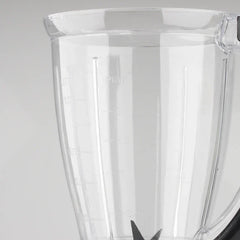 Centrifugal Juicer Machine - Close-up of a clear plastic blender pitcher with molded litre and pint measurement markings and visible blade tips at the bottom
