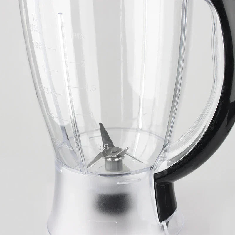 Centrifugal Juicer Machine - Inside view of a clear blender jar showing its multi-blade assembly at the bottom and volume markings