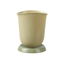 Soporte cerámico para palillos, escurridor y organizador de cubiertos - Organizador de cubiertos beige con base verde sobre fondo blanco