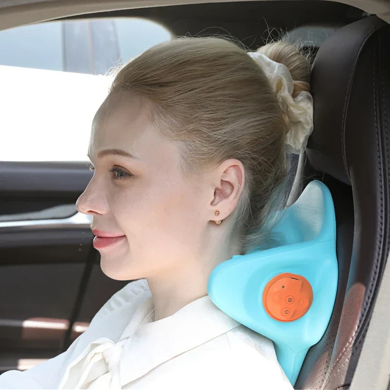 Cervical Acupressure Neck Massage Stretcher - Person using teal stretcher while seated in a car seat