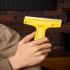 Cleaning Scraper Tool Utility Blade Remover - Scraper removing sticker residue from a smooth surface