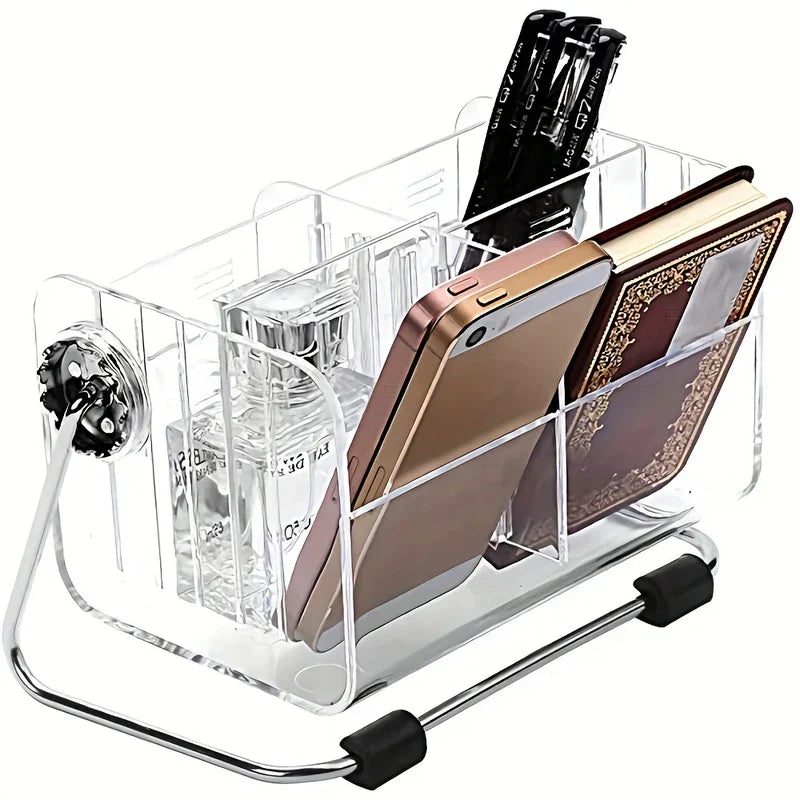 Remote Control Organizer - Clear divided storage organizer on a chrome wire stand holding perfume, phones, a notebook, and pens