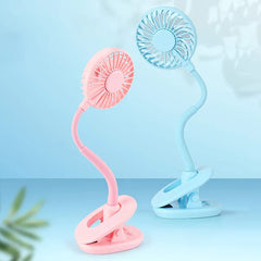 Desk Fan - Pink and light blue clip-on fans with flexible necks, displayed on light blue surface