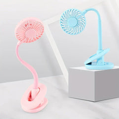 Desk Fan - Pink and light blue clip-on flexible-neck mini fans, one on flat surface one on grey block