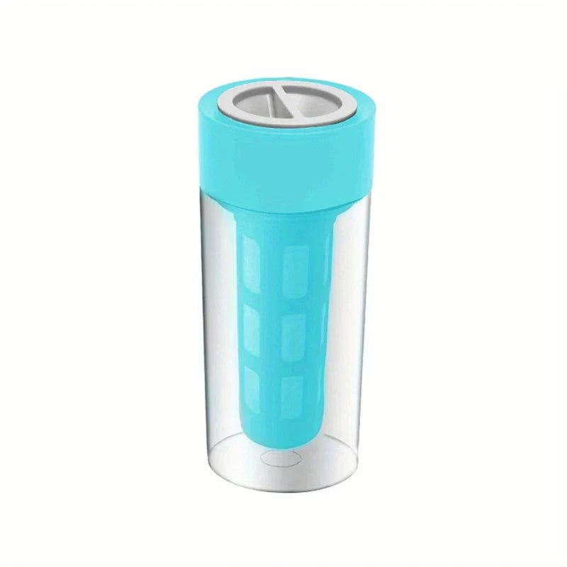 Cold Brew Coffee Maker - Cylindrical clear tumbler with light blue lid and matching internal filter insert, top has gray slotted opening
