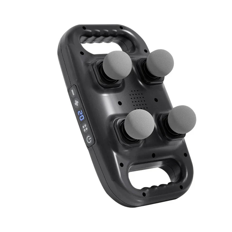 Compact Muscle - Black four-head massage device with two side handles, control panel on left edge with digital display showing 02, and four round gray massage heads on the front face.