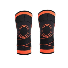Compression Knee Sleeve - Pair of black knee sleeves with orange stitching, circular knee padding, and hook-and-loop top straps