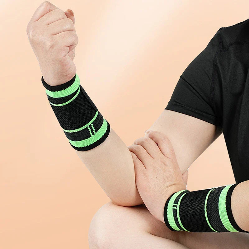 Compression Wrist Brace - Person wearing black and green support wrap on forearm with clenched fist