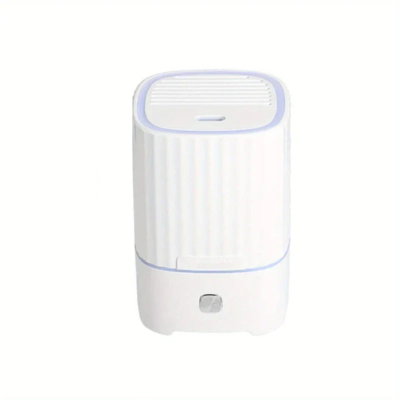 Bedroom Humidifier - White ribbed compact ultrasonic humidifier with light purple accent trim on white background