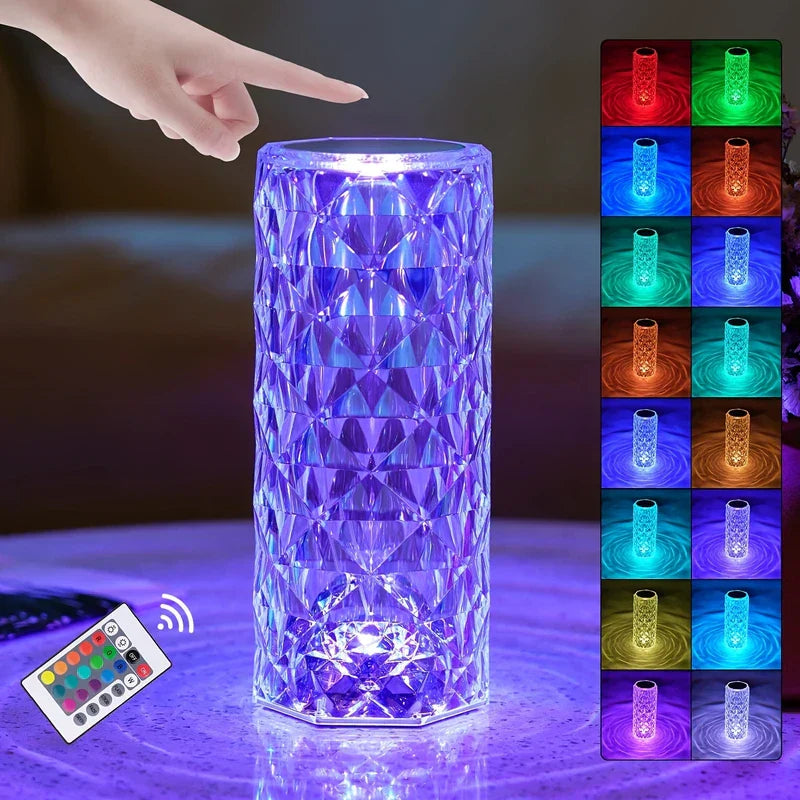 Glowing purple diamond-patterned table lamp with a hand near its top, remote control, and 16 color swatches displayed