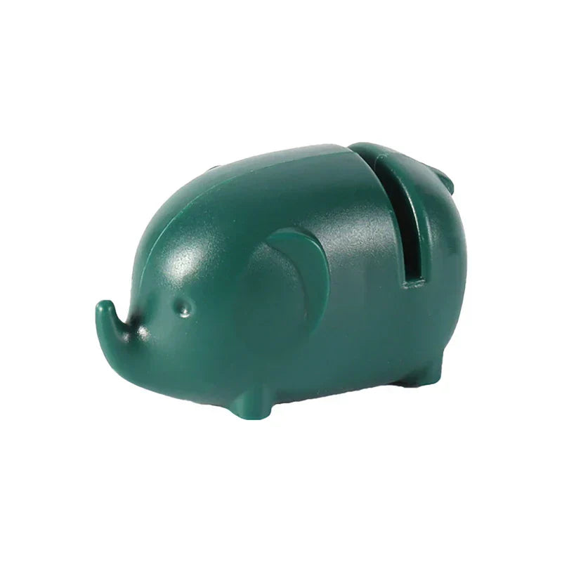 Mini Knife Sharpener - Dark green elephant-shaped small object with a top slot, viewed from a slight angle on white background
