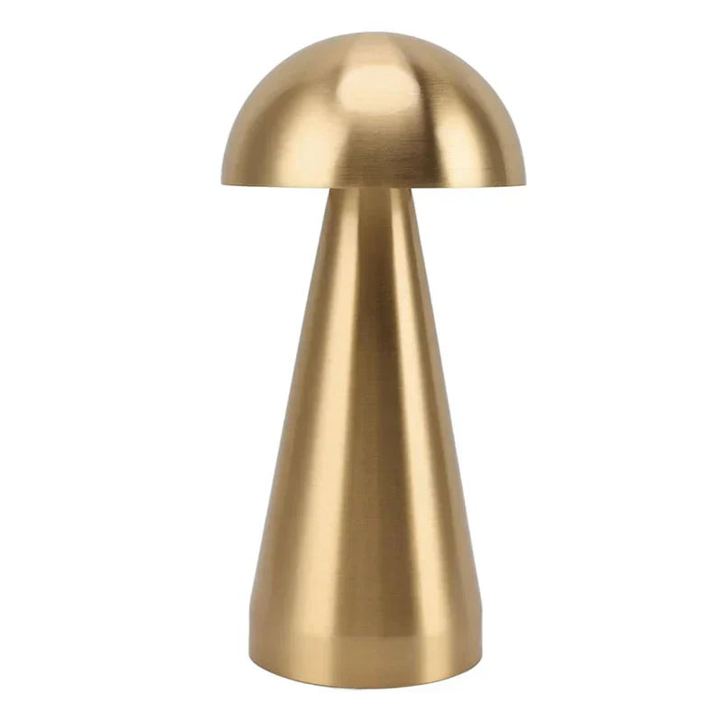 Accent Lamp - Brushed gold mushroom-shaped table lamp on plain white background