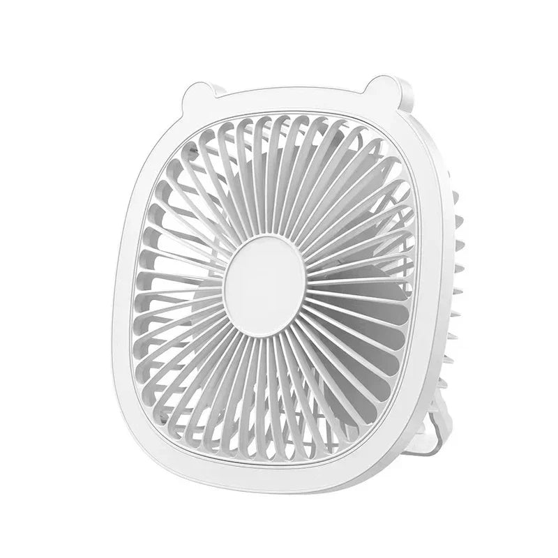 White compact fan with rounded square frame and ear-shaped top accents on white background