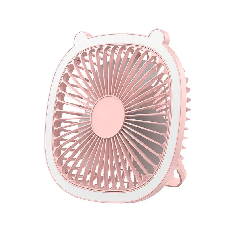 Light pink desktop desk lamp with cooling fan on a plain white background, showing its front design