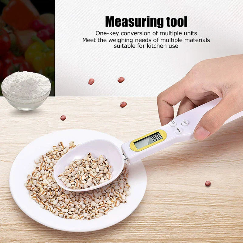 Digital Measuring Spoon Scale - Hand holding weighing spoon to measure grains on a white plate