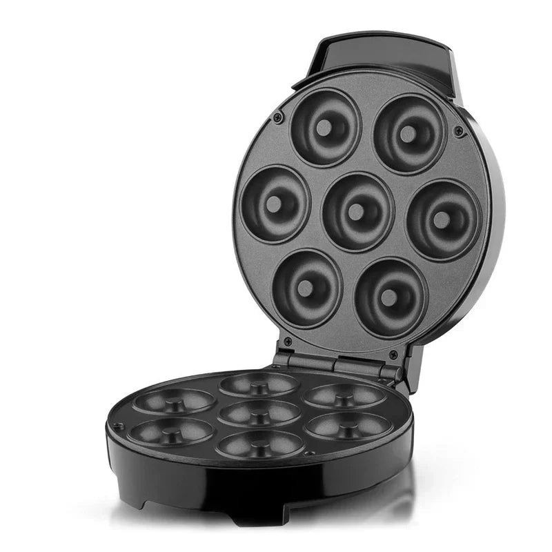 Mini Donut Maker - Open appliance showing seven donut-shaped cooking molds on each interior plate