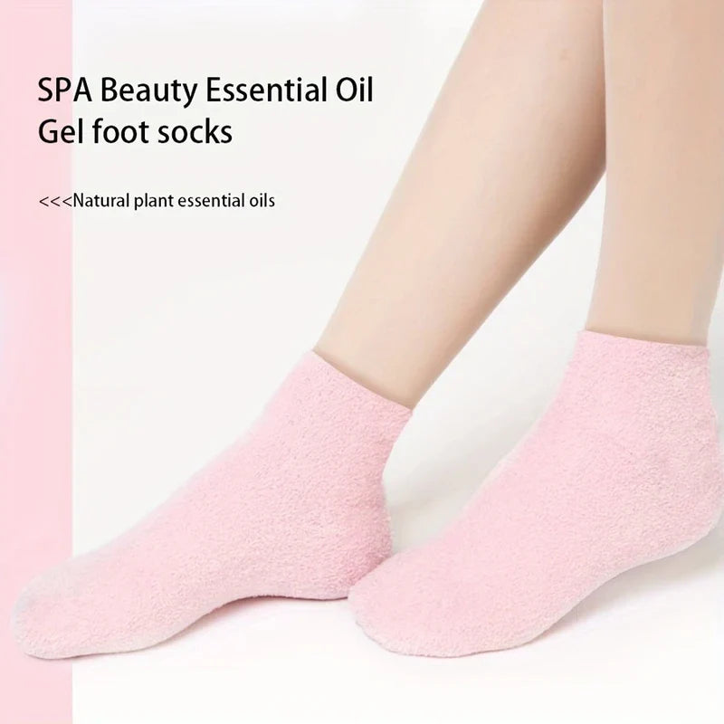 Pair of pink fuzzy gel foot socks worn on a person’s feet, no callus remover pedicure set visible.