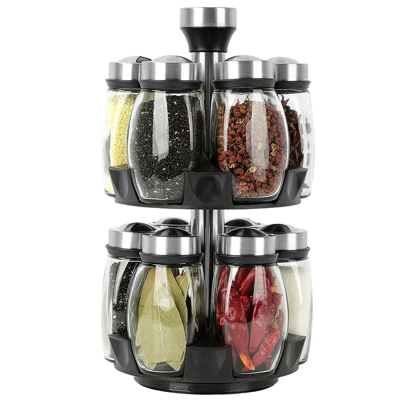 Spice Rack Organizer - Assembled two-tier rotating unit holding glass jars filled with assorted dried spices and seasonings