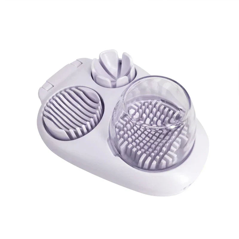 Egg Slicer - 3-in-1 kitchen tool with slice, wedge, and dice cutting compartments on white base