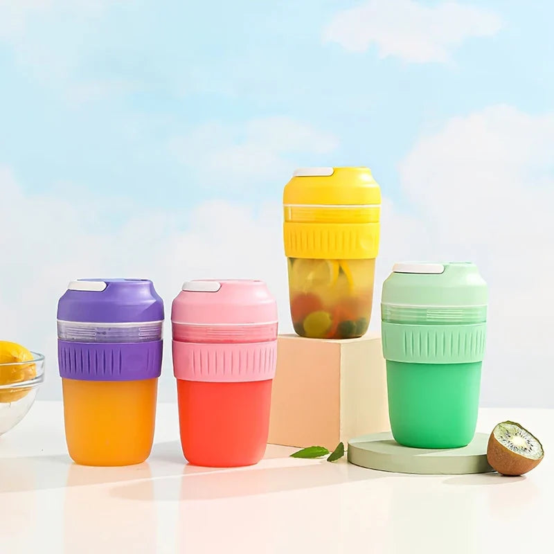 Electric Citrus Juicer - Full color assortment of juicers displayed on a white countertop with cut fruit accents