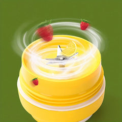 Electric Citrus Juicer - Close-up of yellow blender blade base in operation with strawberries and a lemon slice showing blending motion.