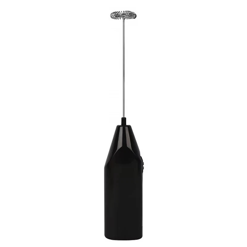 Electric coffee stirrer mixer frother whisk held over a coffee cup