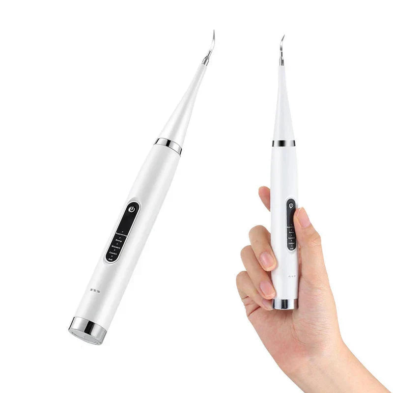 Plaque Remover - Cleaning unit shown at an angle and held in a hand to demonstrate compact, handheld size