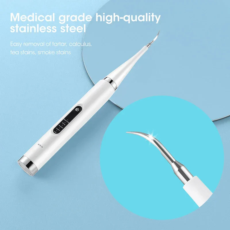 Plaque Remover - White electric dental scaler with a close-up inset of its curved stainless steel tip