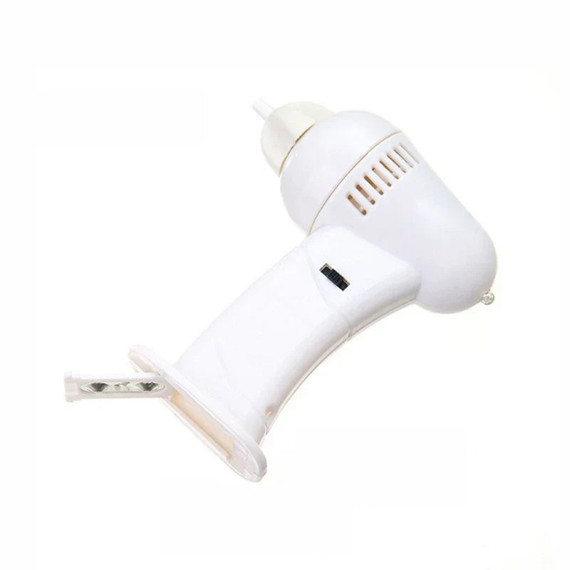 Electric ear wax removal tool in use