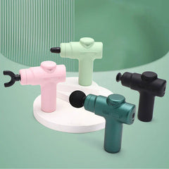Electric Fascia Vibration Recovery Gun - Assorted color handheld massage devices with varied attachment heads displayed on tiered stands