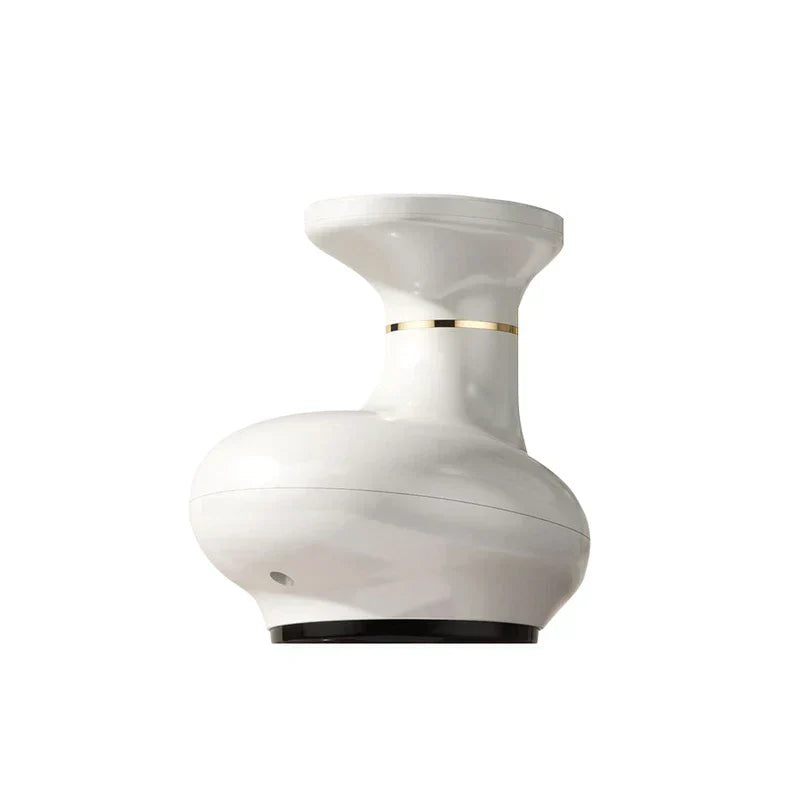 Electric Gua Sha Tool - White handheld massage device with a thin gold accent band and black base, shown from a side angle against a white background.