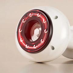 Electric Gua Sha Tool - Close-up of a white massager’s working head with illuminated red lights around the suction opening