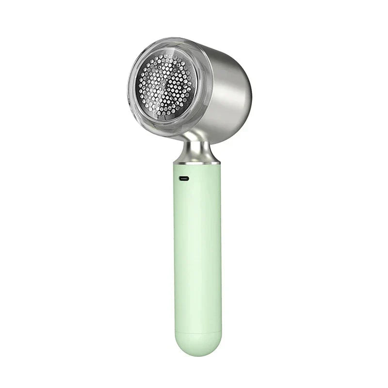 Trimmer - Mint green and silver handheld electric grooming tool with perforated metal head, shown upright against a plain white background