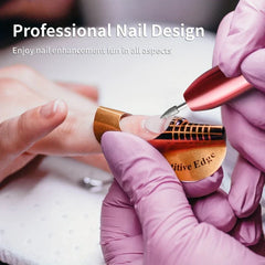 Gloved hands use a rose gold electric nail drill on a fingernail with a gold form guide placed on the nail.