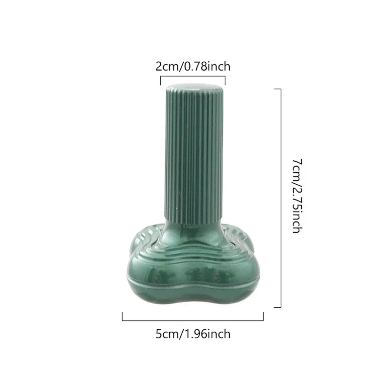 Hair Trimmer - Green handheld device with ribbed vertical grip and rounded base, shown with width and height dimensions labeled.