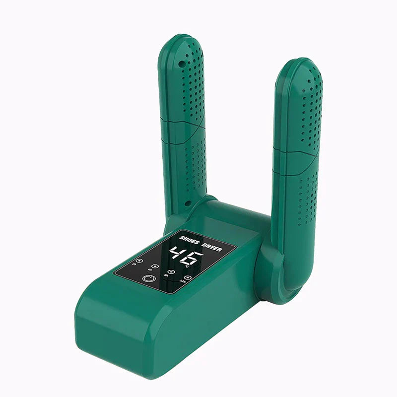 Teal electric shoe dryer with two vertical prongs, a digital control display, and a sleek plastic body against a plain white background